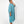 Load image into Gallery viewer, Side view of beautiful black woman wearing Dessous Loungewear's Bianca caftan midi dress in sustainable Lyocell turquoise fabric.
