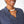 Load image into Gallery viewer, Close up of neckline of Dessous Loungewear Bianca caftan in navy sustainable Cupro fabric.