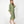 Load image into Gallery viewer, Side view of Beautiful Asian woman wearing Dessous Loungewear Bianca Caftan in moss green sustainable Lyocell fabric.