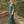 Load image into Gallery viewer, Woman wearing green and navy marble print, maxi-length sustainable caftan.