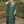 Load image into Gallery viewer, Front view of woman wearing green and navy marble print caftan in eco-friendly Tencel Lyocell fabric. The caftan is maxi-length with a V neckline.