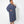 Load image into Gallery viewer, Side view of beautiful black woman wearing Dessous Loungewear Bianca caftan in navy sustainable Cupro fabric. Caftan with pockets.
