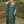 Load image into Gallery viewer, Front view of woman wearing green and navy marble print caftan in eco-friendly Tencel Lyocell fabric. The caftan is maxi-length with a V neckline.
