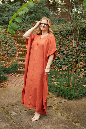 The chic, timeless elegance of our Grace caftan was inspired by movie star, princess and fashion muse Grace Kelly. Grace is our classic, flowy maxi-length caftan design with an oversized, body skimming silhouette that makes it a versatile choice for lounging at home, as a cover up at the beach, or even dressed up with jewelry and strappy sandals for a formal event. The eco-friendly fabric is 100% Tencel™ Lyocell which is sustainable, biodegradable and compostable. 